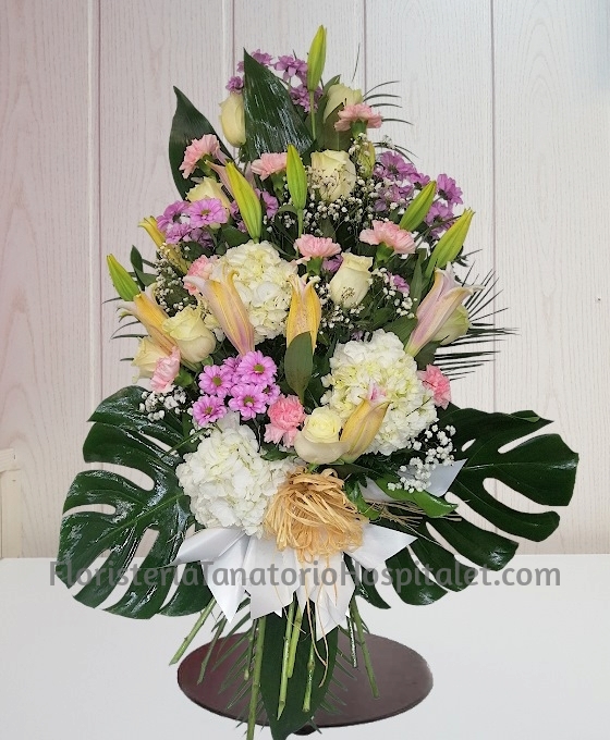 Ramo para funeral tonos rosas con envío urgente